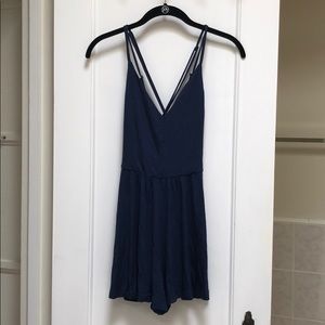 Soft blue romper with low strappy back NWOT